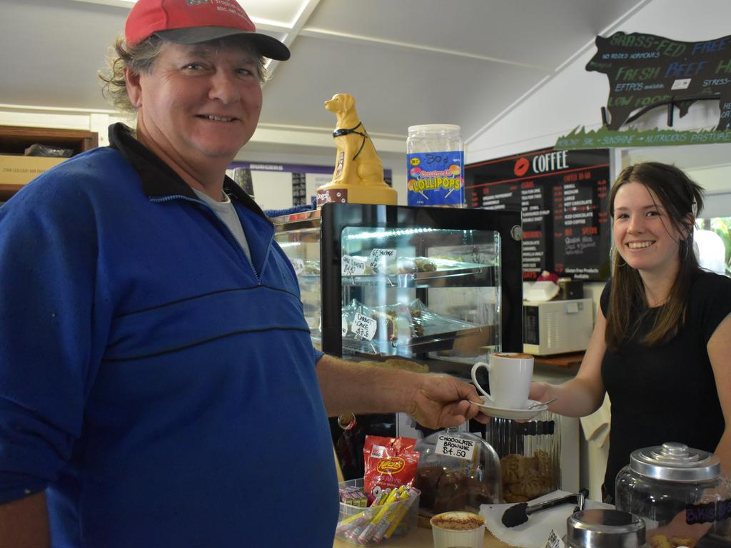 Eungella resident Dale Fortescue buying his last cup of coffee prepared by Indiana Sheehy at the Eungella General Store. Picture: Heidi Petith