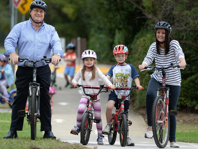 Bring a helmet and your bike for an important lesson in bike safety: Paul Lake, siblings Hannah (6) and Jack (8) Epple from Blair Athol with their aunty Kate Campbell.