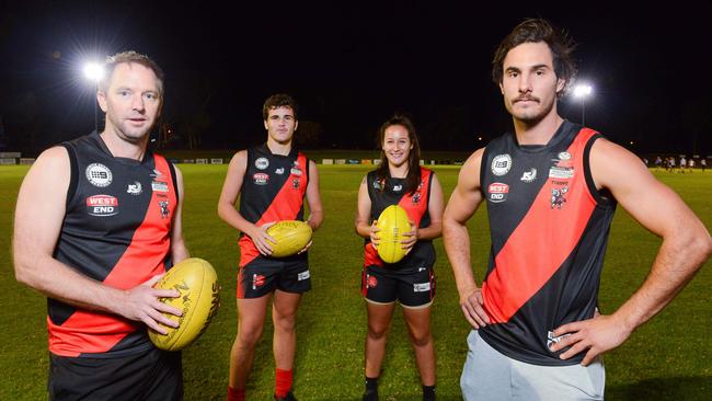 Troy Menzel (R) pictured with ex-AFL boundary umpire Jono Creasey, under 18 players Wil Cansdell and Haley Pickering. Picture: AAP/Brenton Edwards