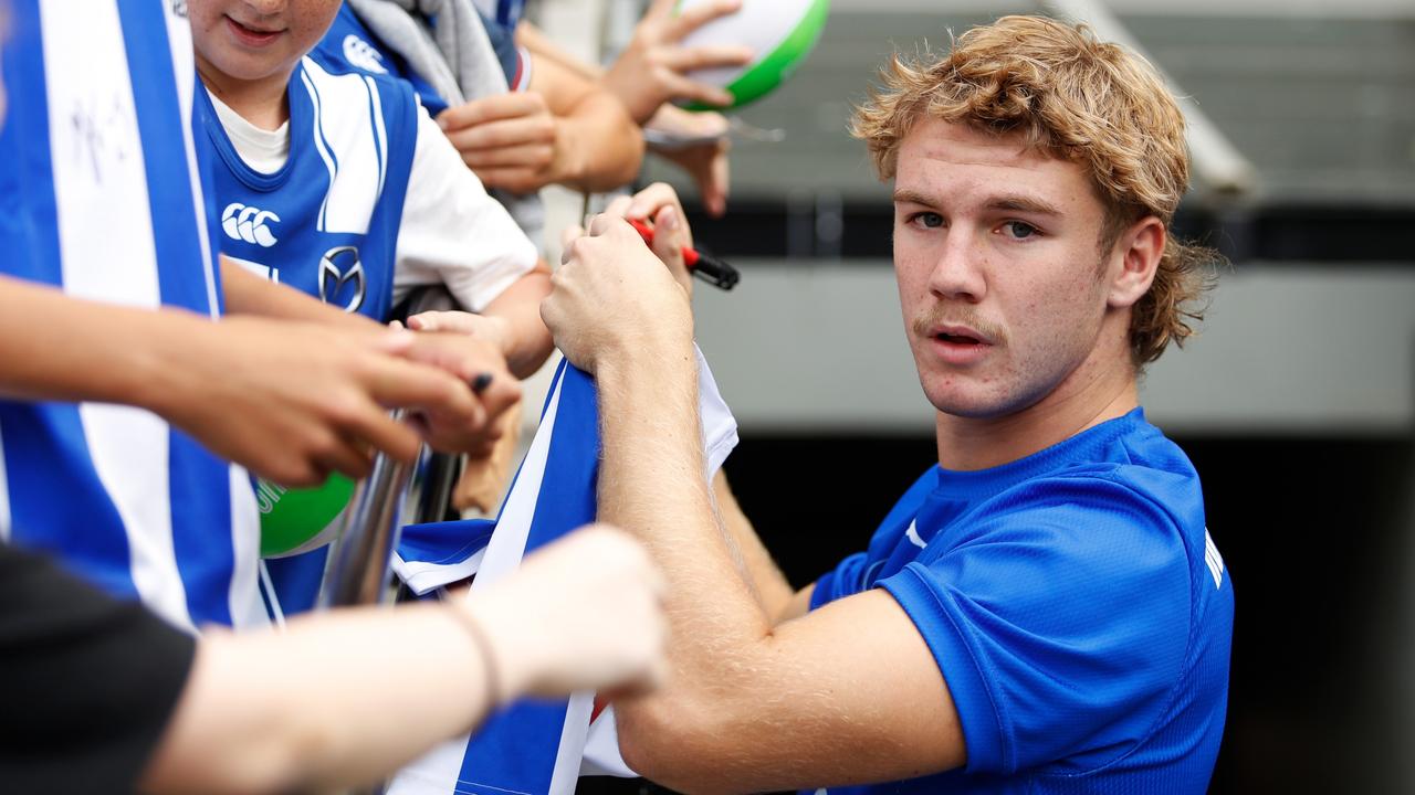 Jason Horne-Francis signs autographs for Kangaroos fans. Picture: Dylan Burns