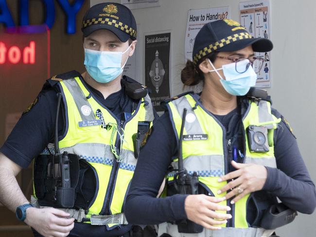 MELBOURNE AUSTRALIA - NewsWire Photos AUGUST 21, 2020: Protective service officers leave the Brady Hotel in Melbourne CBD on Friday morning. The hotel has been given the contract to act as a Covid 19 quarantine centrePicture: NCA NewsWire / David Geraghty