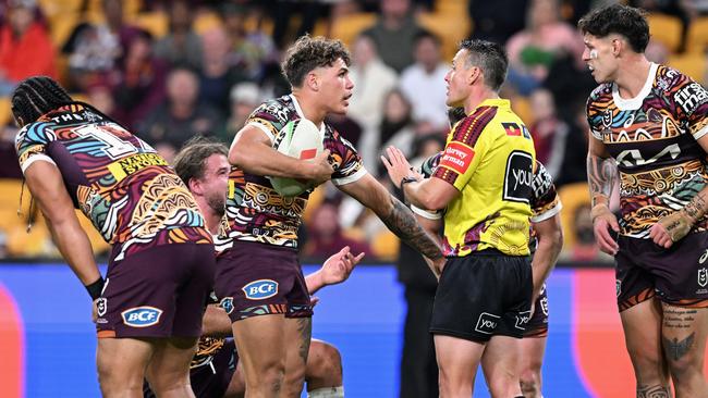 Reece Walsh remonstrates with referee Adam Gee. (Photo by Bradley Kanaris/Getty Images)