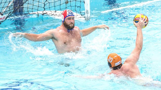 Rick Joustra and Daniel Hansen in the Queensland Premier League Water Polo match between North Brisbane Polo Bears and Carina Leagues Warriors. Picture: Richard Walker