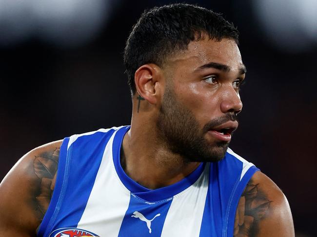 MELBOURNE, AUSTRALIA - AUGUST 12: Tarryn Thomas of the Kangaroos in action during the 2023 AFL Round 22 match between the North Melbourne Kangaroos and the Essendon Bombers at Marvel Stadium on August 12, 2023 in Melbourne, Australia. (Photo by Michael Willson/AFL Photos via Getty Images)