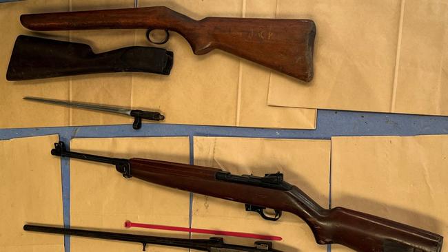 Ammunition and six unregistered riffles, including a SKK 7.62 rifle, allegedly seized by police from Mr Parsons’ home.