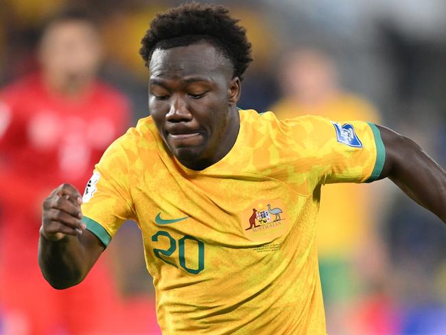 GOLD COAST, AUSTRALIA - SEPTEMBER 05: Nestory Irankunda of Australia competes for the ball during the round three 2026 FIFA World Cup AFC Asian Qualifier match between Australia Socceroos and Bahrain at Robina Stadium on September 05, 2024 in Gold Coast, Australia. (Photo by Matt Roberts/Getty Images)