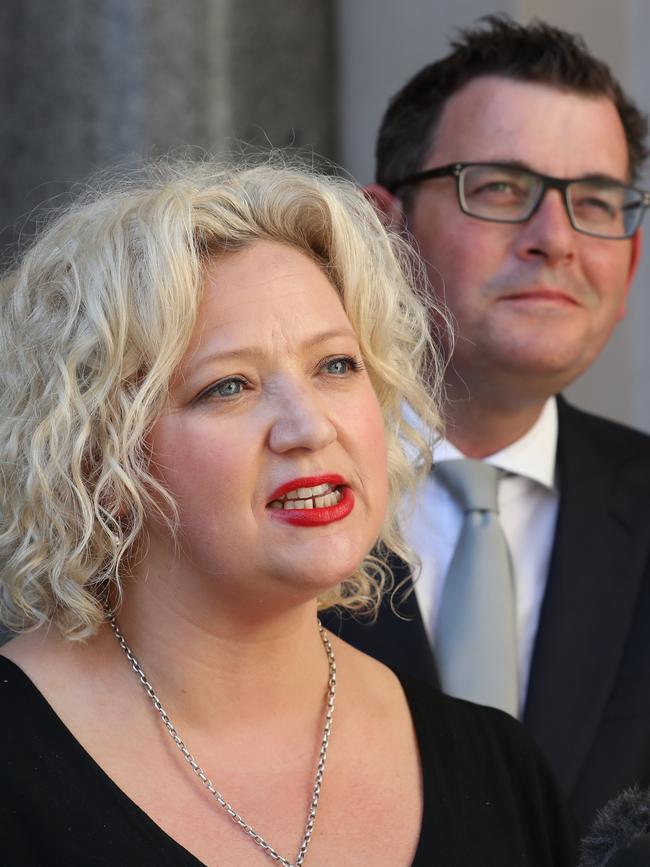 Victorian Premier Daniel Andrews looks on as Health Minister Jill Hennessy speaks during a press conference after the Voluntary Assisted Dying Bill 2017 passed in the Victorian Legislative Council in 2017. (AAP Image/David Crosling)