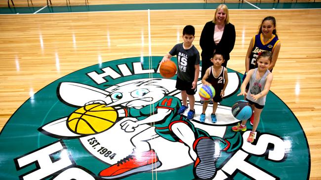 Hills Mayor Michelle Byrne with Osbon Liu, Philip kouthouris, Sasha burton and Akahia Lomu on the new courts at Hills Sports Stadium.