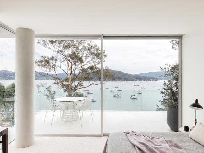 Bedroom with balcony and a view of Scotland Island.