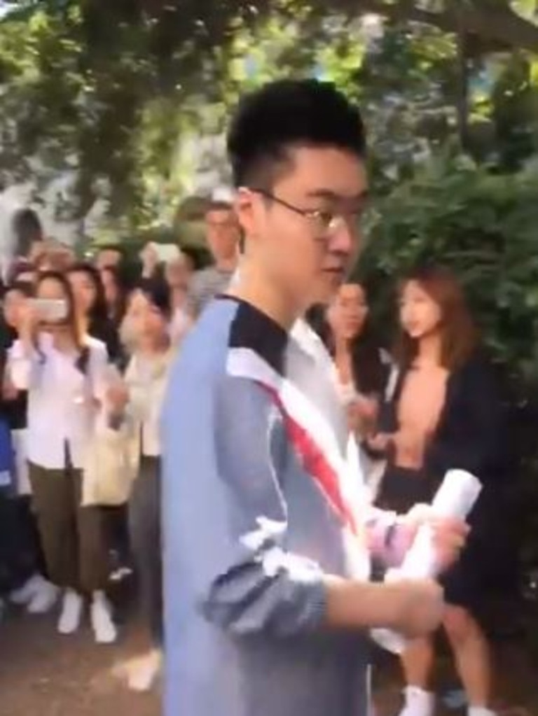 Pro-Beijing students attack participants at a Hong Kong demonstration at The University of Queensland. Picture: Nilsson Jones