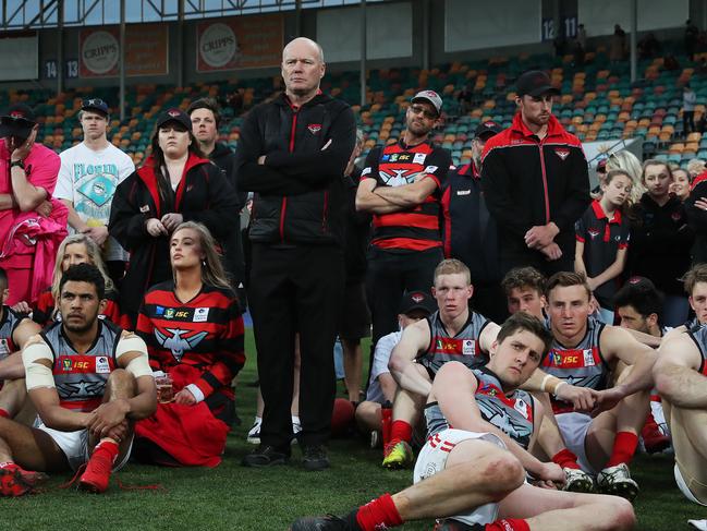 Lauderdale coach Darren Winter stands with the Lauderdale playing group following the TSL grand final. Picture: NIKKI DAVIS-JONES