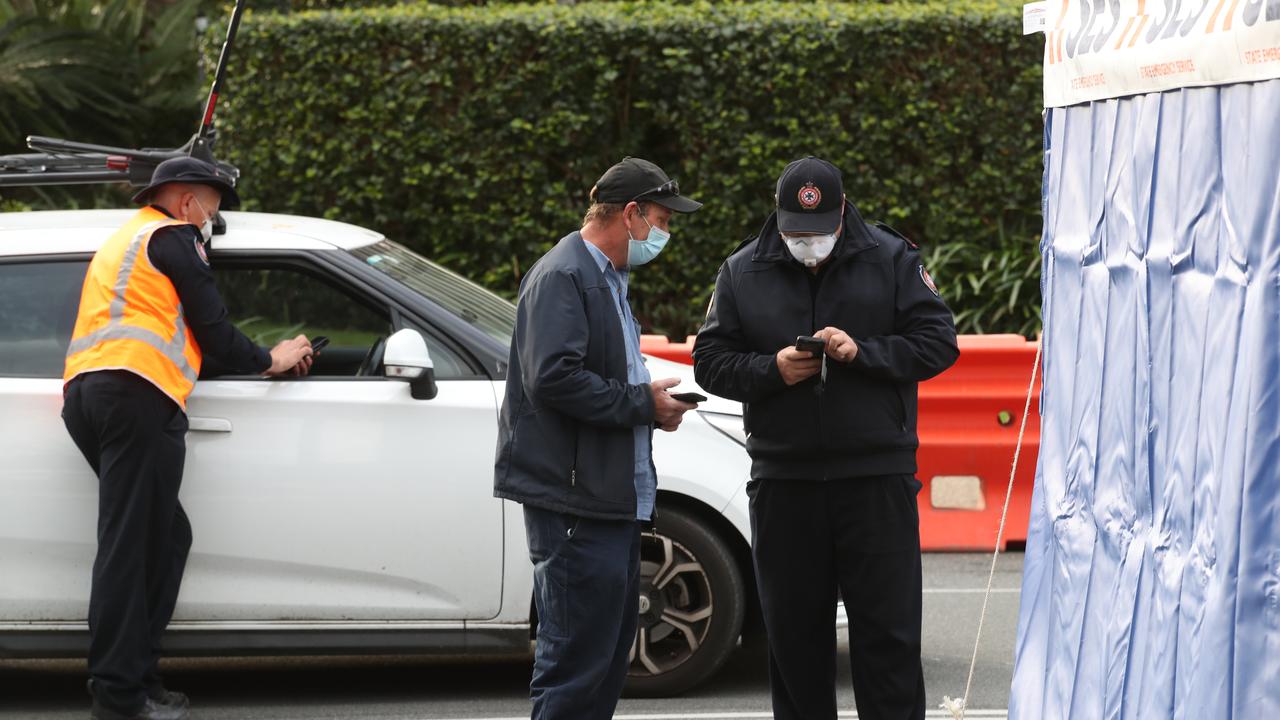 The hard border and long Queues return to the Qld NSW border on the Gold Coast. People getting the thumbs up or turned away in Griffith St Coolangatta. Picture: Glenn Hampson.