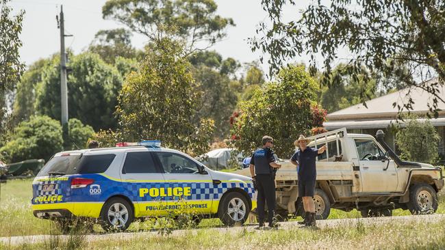 Police check another Toyota Land Cruiser.  Picture: Jason Edwards