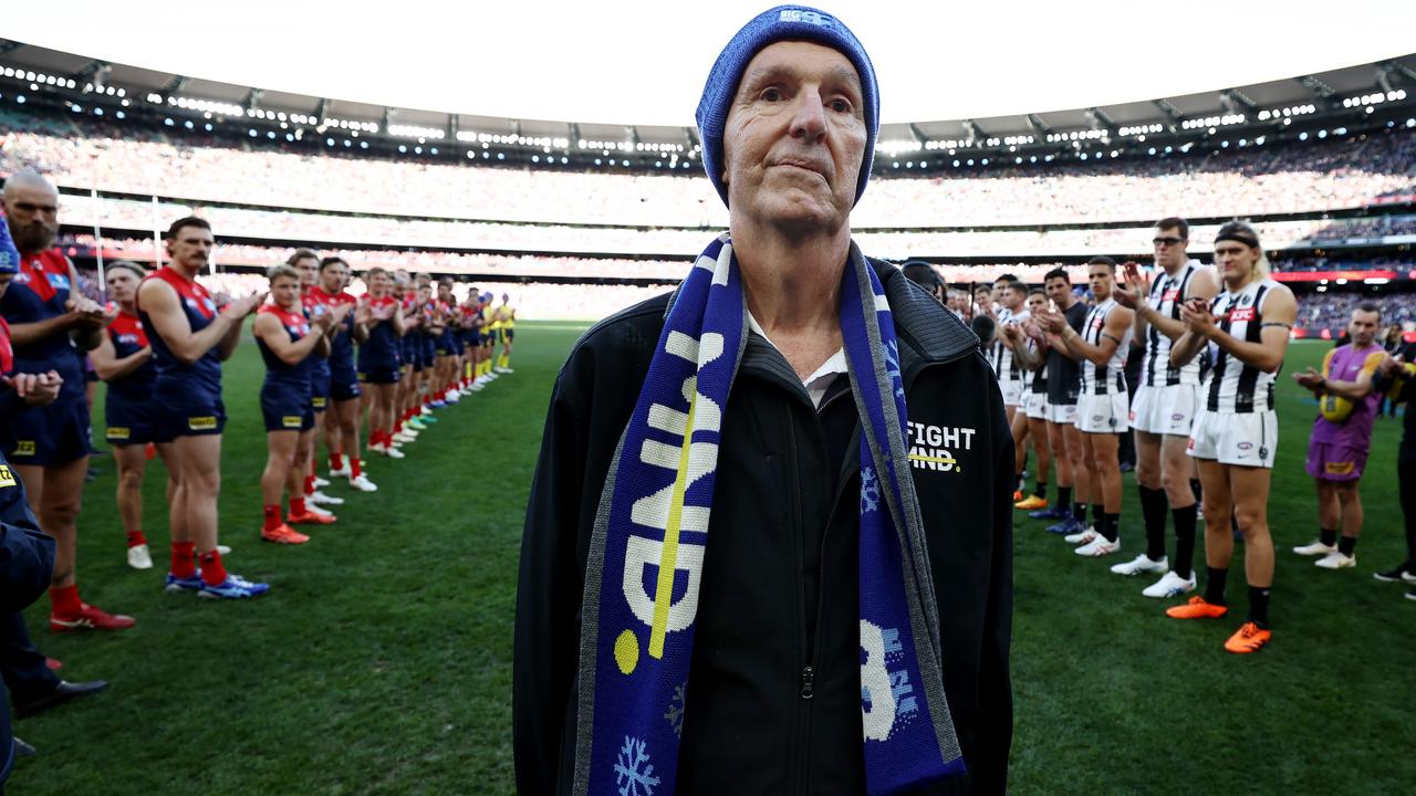 Neale Daniher walks through a guard of honour. Picture: Michael Klein