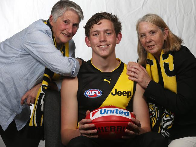 Riley Collier-Dawkins with mothers Chris and Jacinta. Picture: Michael Klein