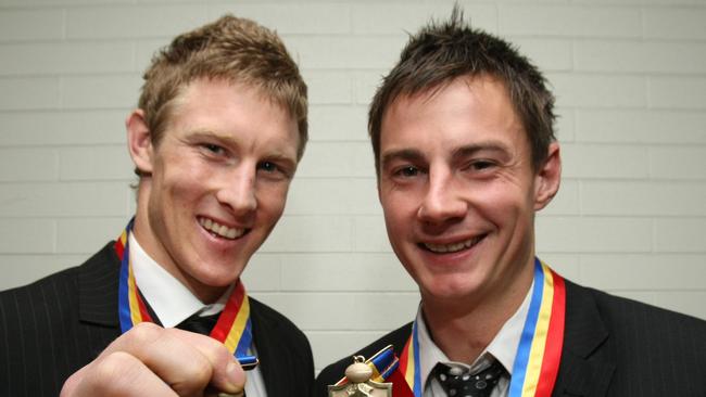 Rhys Archard (right) with James Ezard after the pair tied in the SANFL’s Magarey Medal in 2009.