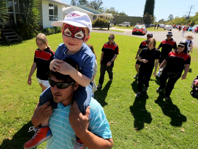 Declynlee Dixon on his dad Chris's shoulders among families in the ‘Walk 4 William’ to raise awareness about the disappearance. Picture: Nathan Edwards.