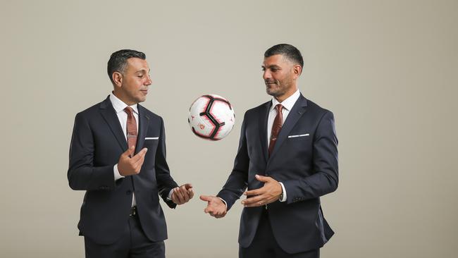 Ross Aloisi (left), pictured wit his brother John, is Brisbane Roar’s new coach. Picture: Mark Cranitch