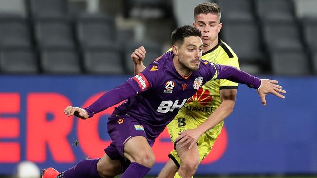 Bruno Fornaroli being tackled by Cameron Devlin in the A-League.