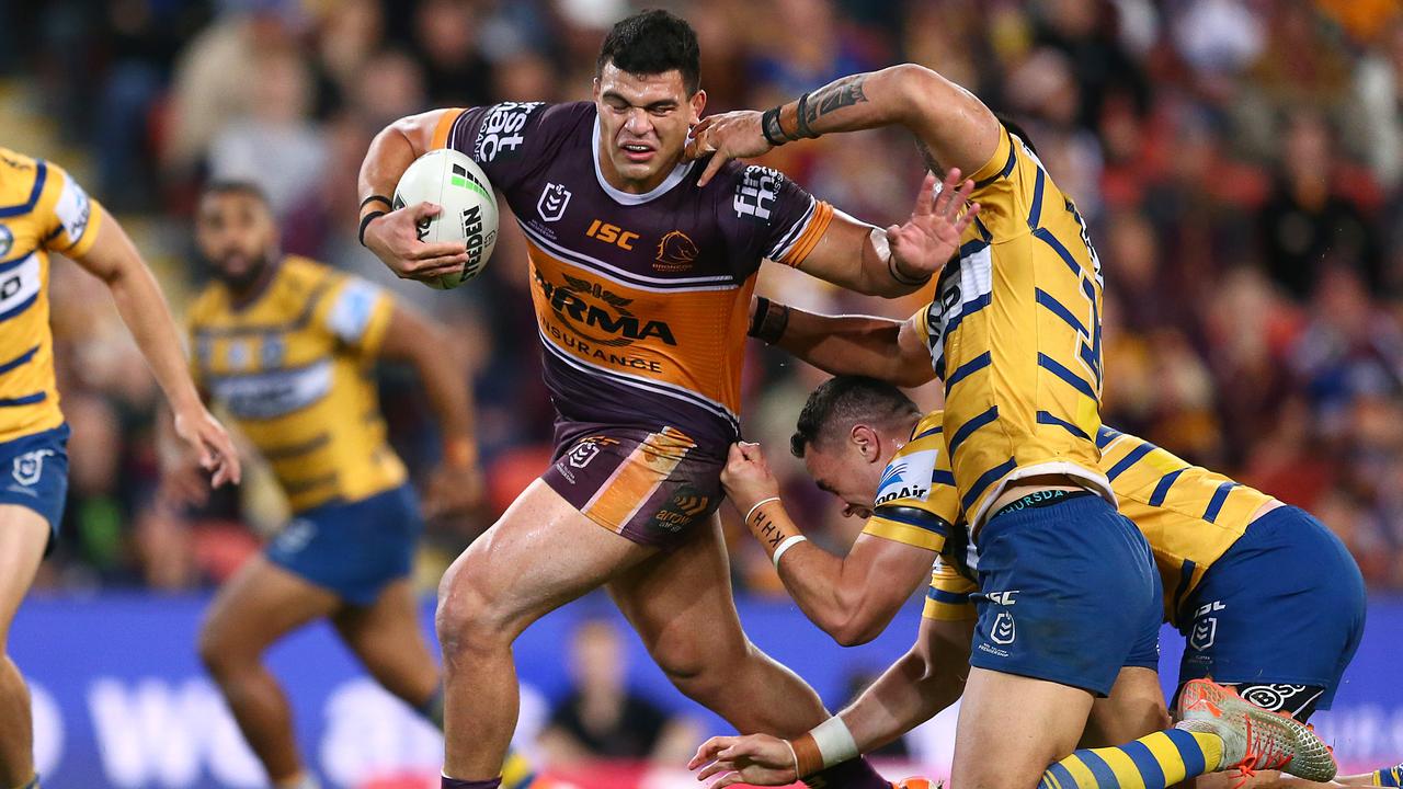 David Fifita of the Broncos breaks free from a tackle