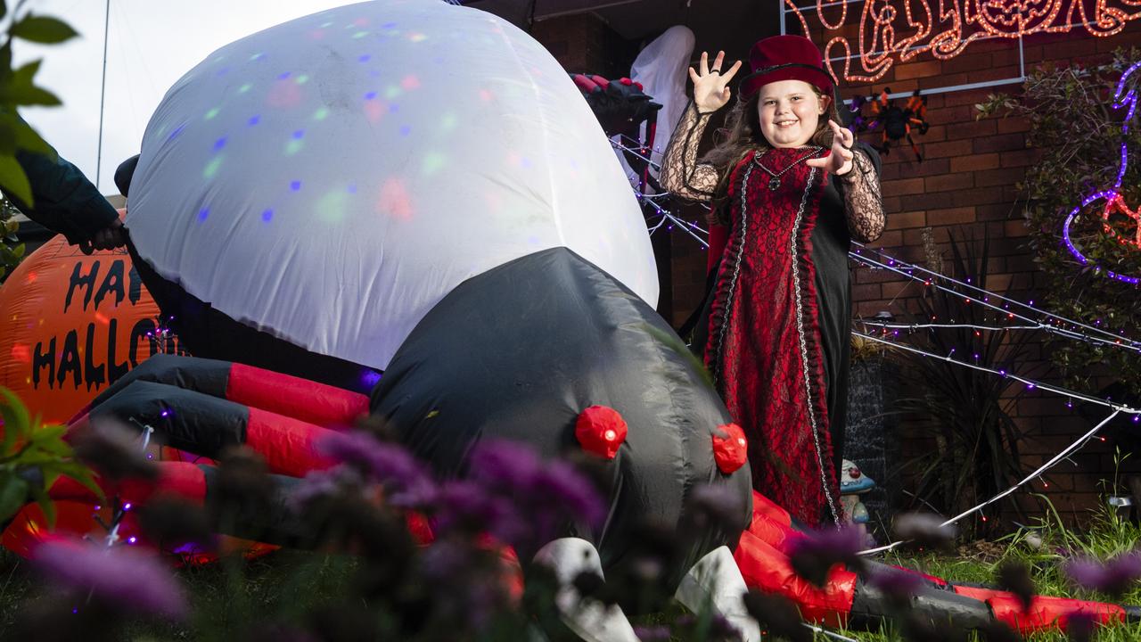 Isabella Botten’s Kearneys Spring home in Queensland has been turned into a scare house, complete with giant spider, for Halloween. Picture: Kevin Farmer