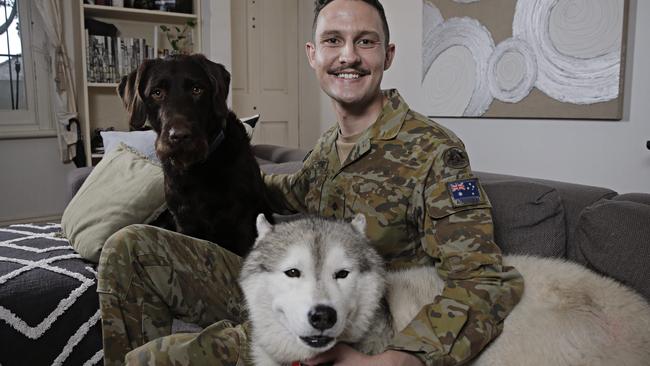 Captain Hugo Toovey with his dogs Ernie, left, and Iggy at his home in Sydney’s Bondi. Picture: Adam Yip