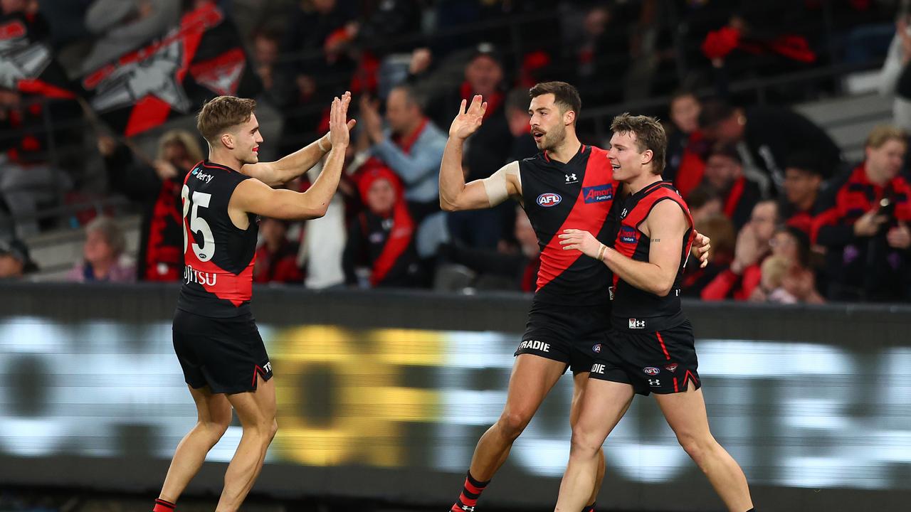 MELBOURNE, AUSTRALIA - AUGUST 05: Kyle Langford of the Bombers celebrates kicking a goal during the round 21 AFL match between Essendon Bombers and West Coast Eagles at Marvel Stadium on August 05, 2023 in Melbourne, Australia. (Photo by Graham Denholm/AFL Photos via Getty Images)