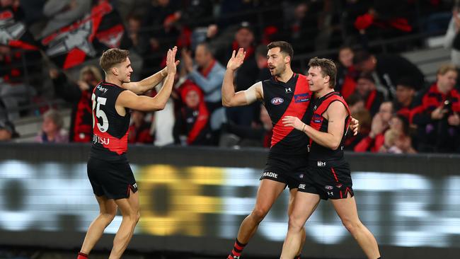 MELBOURNE, AUSTRALIA - AUGUST 05: Kyle Langford of the Bombers celebrates kicking a goal during the round 21 AFL match between Essendon Bombers and West Coast Eagles at Marvel Stadium on August 05, 2023 in Melbourne, Australia. (Photo by Graham Denholm/AFL Photos via Getty Images)