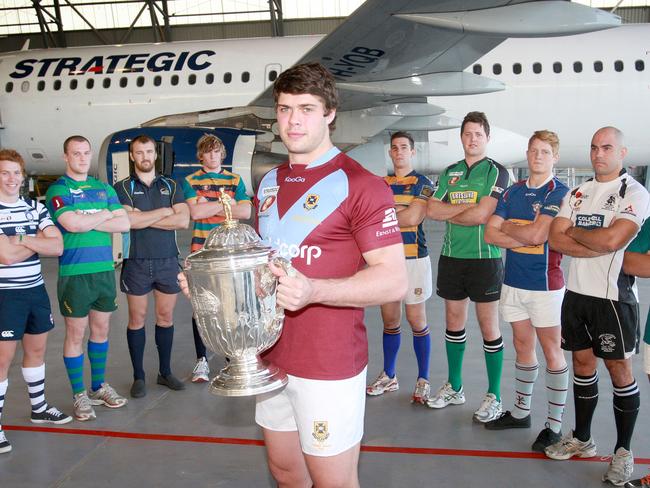 14.3.2011 Qld Rugby captians at Stragegic Airlines hangar. L to R Dallan Murphy (brothers), Jono Ellis (GPS) Gareth Clouston (sunshine Coast) Greg Melton (gold Coast) Tim Buchanan (university, with cup) Luke Bertini (easts), James Kruikelis (sunnybank) Sam Pervis (norths) Aaron Willis (Souths) and Nigel Genia (wests). Pic Jono Searle