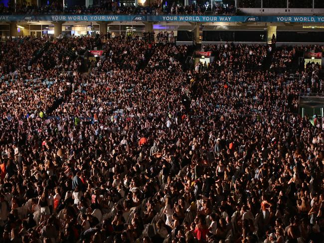 Part of the 70,000 who appeared to love every second that Bieber was on stage. Picture: Jonathan Ng