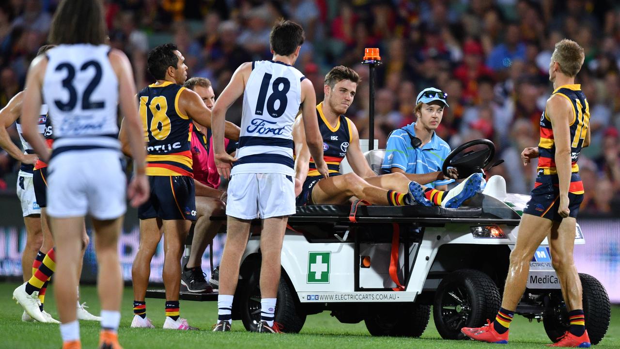 Paul Seedsman is taken off the field. (AAP Image/David Mariuz) 