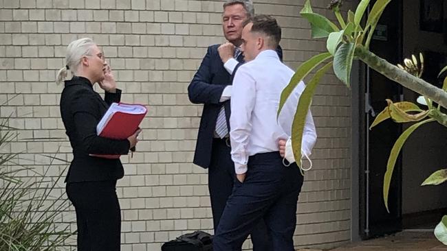 Zain Papa (far right) talks with lawyers after his sentence was handed down before Tweed Heads Local Court.