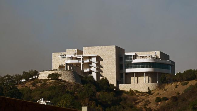 Smoke from the Palisades Fire rises over the Getty Museum on January 11. Picture: AFP