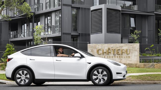 A Tesla Model Y is exclusively available at Chateau Showground in Castle Hill as part of an innovative shared electric vehicle scheme called the 'Electric Car Club'. Picture: Robert Cameriere