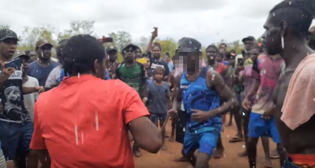 Men were filmed fighting on the streets of Doomadgee. Picture: supplied.