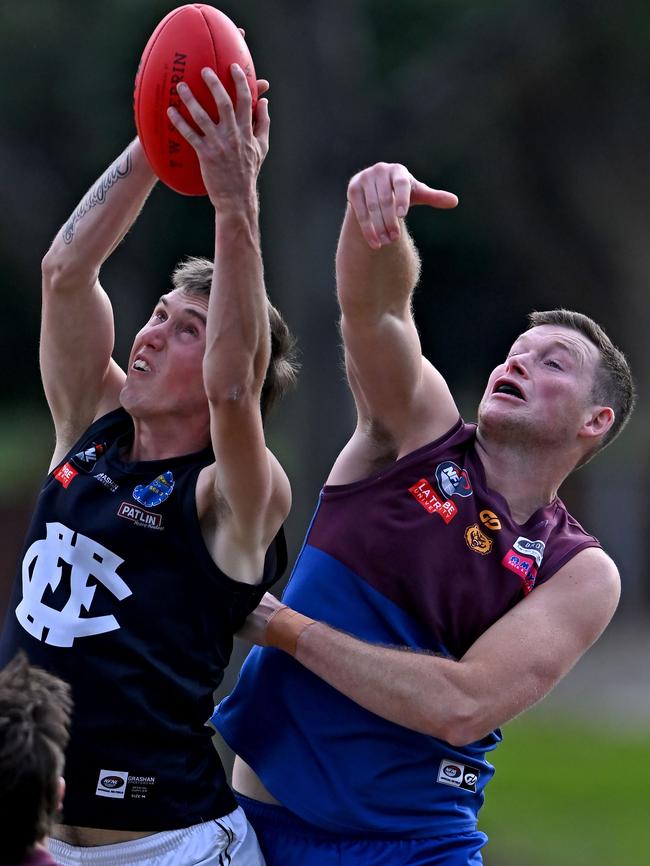 NFL: Epping’s Tom Burnside marks in front of Daniel Langford from Banyule. Picture: Andy Brownbill