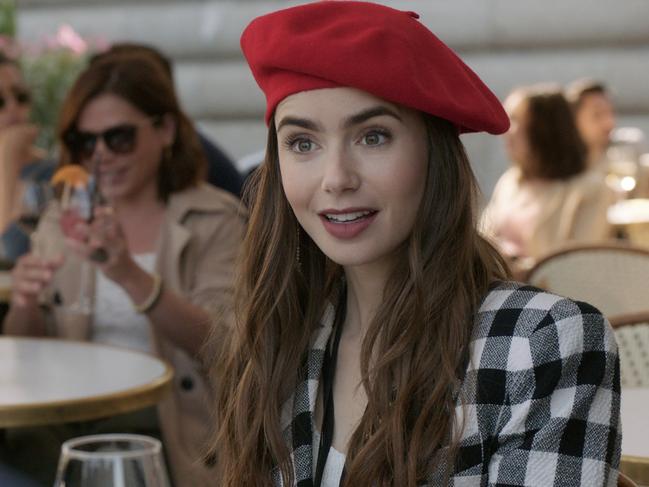 EMILY IN PARIS (L to R) LILY COLLINS as EMILY in episode 103 of EMILY IN PARIS. Cr. COURTESY OF NETFLIX Â© 2020