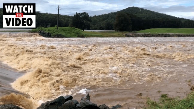 Water gushes over Oxenford Weir on the Gold Coast