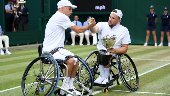 Dylan Alcott of Australia shakes the hand of opponent Andy Lapthorne of Great Britain after their Men's singles Quad Wheelchair final at Wimbledon. Picture: Matthias Hangst/Getty Images