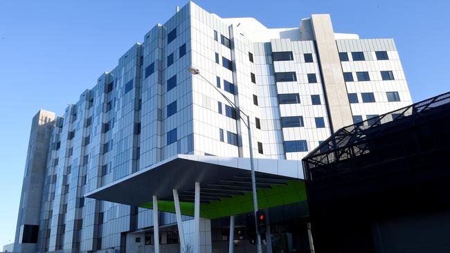 Minister for Health David Davis to welcomes the first patient to the new Box Hill Hospital. Sarah Iannelli with her newborn Darcy Darragh from Kilsyth. The transfer of patients from the old facility to the new begins on Tuesday morning. Picture: Nicole Garmston