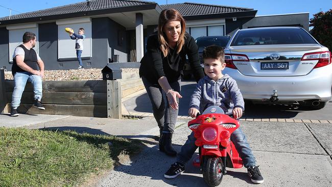 Basic cost of living: Melissa and Nick Isgro with their sons Julian, 5 and Jonah, 3 at home in Gladstone Park. Picture: Ian Currie