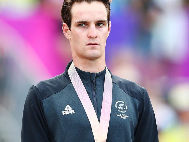 GOLD COAST, AUSTRALIA - APRIL 12:  A pensive gold medallist Samuel Gaze of New Zealand looks on during Mountain Bike on day eight of the Gold Coast 2018 Commonwealth Games at Nerang Mountain Bike Trails on April 12, 2018 on the Gold Coast, Australia.  (Photo by Michael Dodge/Getty Images)