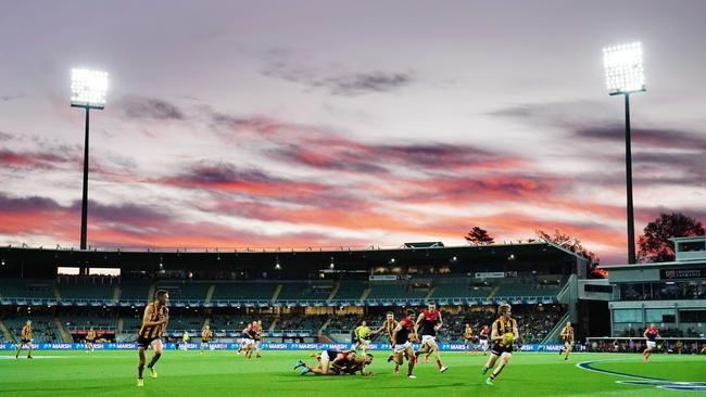 The Hawks taking on the Demons in a pre-season match in Launceston last year.