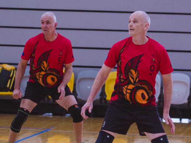 Action as Sparta v the Crippled Wombats in the Pan Pacific Masters Games Volleyball tournament. Picture: Glenn Campbell