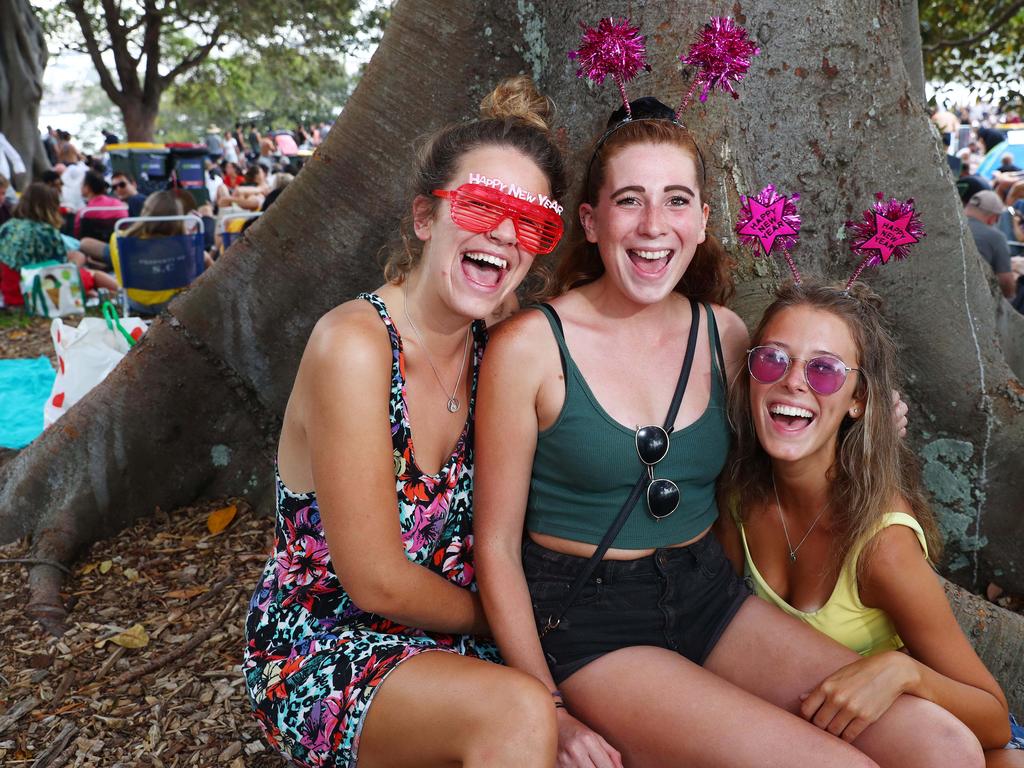 Emma Pretorius, Maxine Owen and Emily Collins at Mrs Macquarie's Chair in Sydney. Picture: John Feder/The Australian.