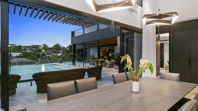 The dining area looks out to the outdoor entertainment zones.