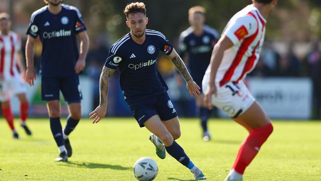 Alex Salmon in action for Oakleigh Cannons.