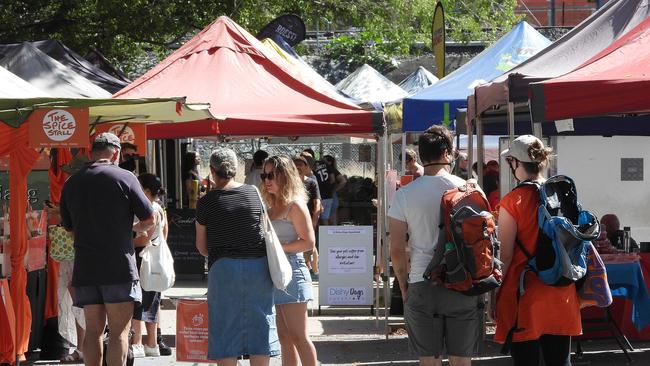 Brisbane’s Milton Markets were mostly quiet over the weekend yet some customers still sat around to eat and talk. Picture: Lyndon Mechielsen