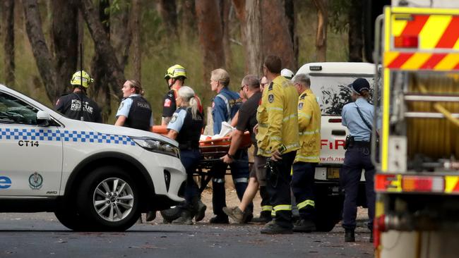 Emergency services with a stretcher at Keith Longhurst Reserve. Picture: NCA NewsWire / Damian Shaw