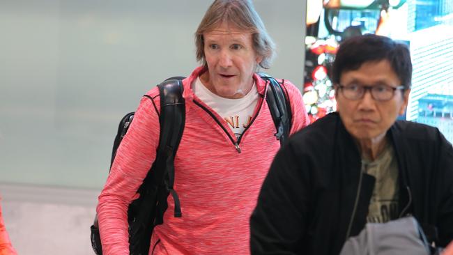 Swimming coach Denis Cotterell arrived at Sydney Airport today.